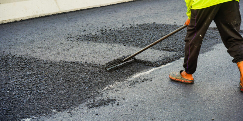 The,Highway,Construction,Site,Is,Paving,The,New,Asphalt,Pavement.